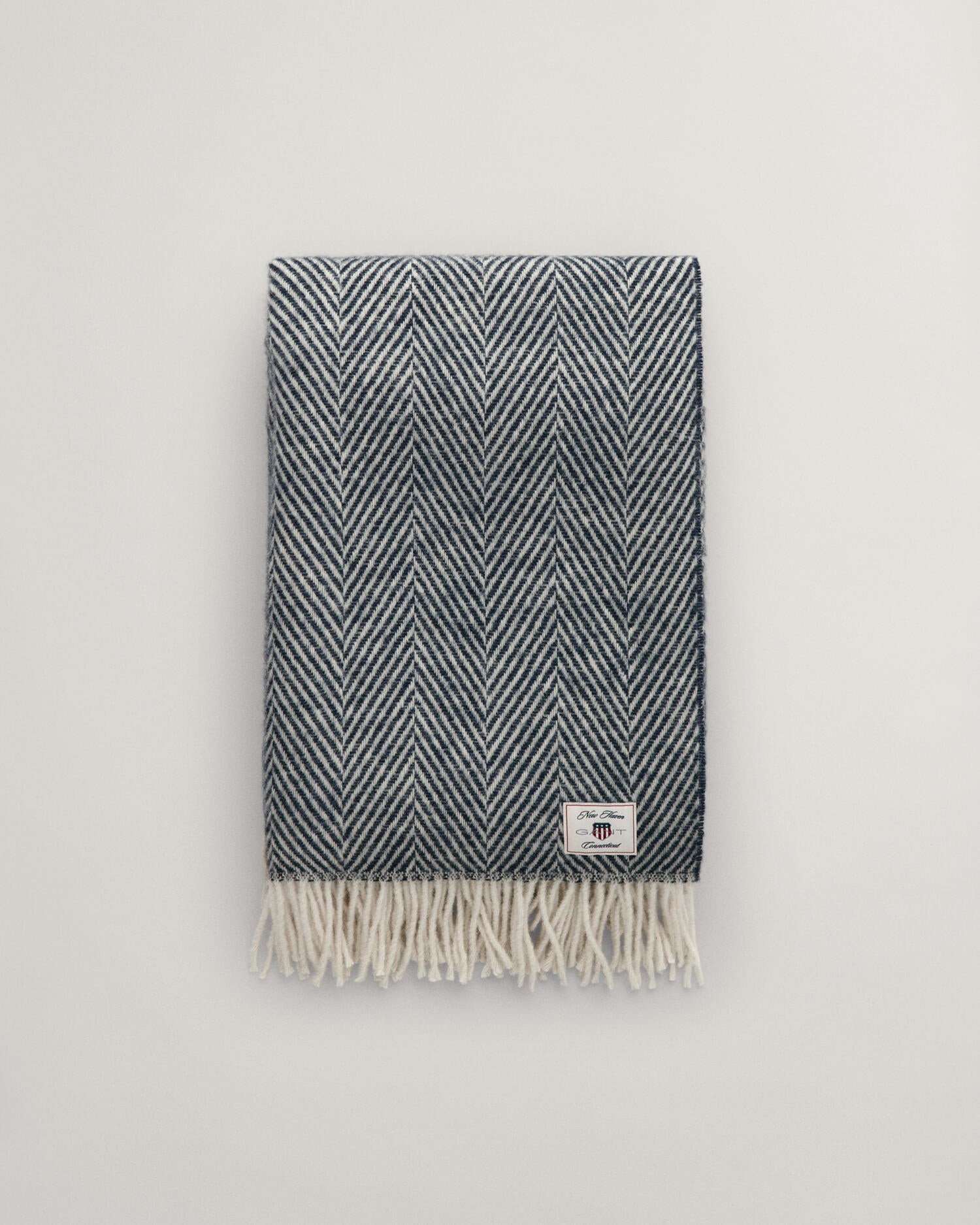 Kalanruotokuvioinen villainen torkkupeitto, useassa eri värissä