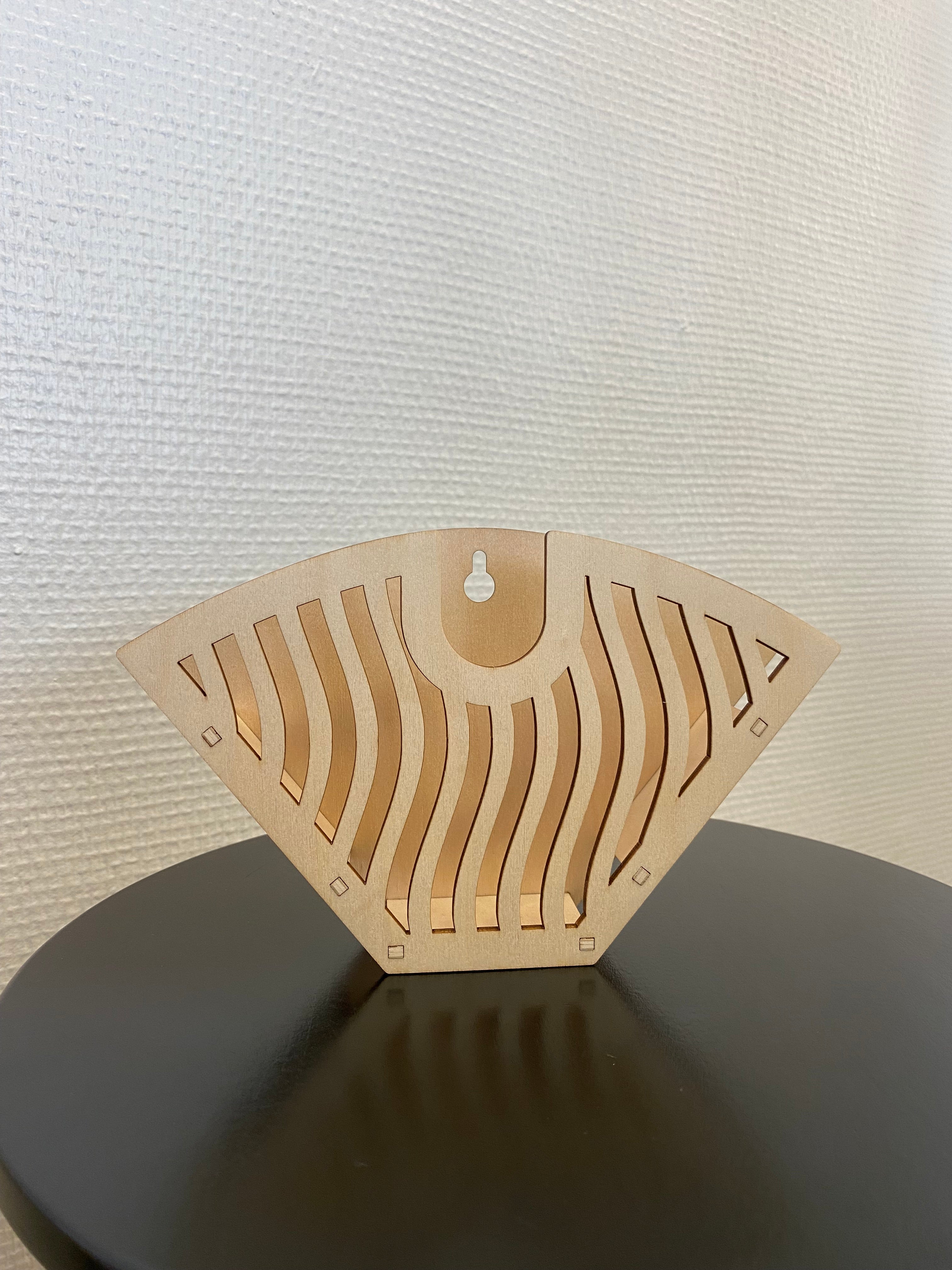 Puinen suodatinpussiteline