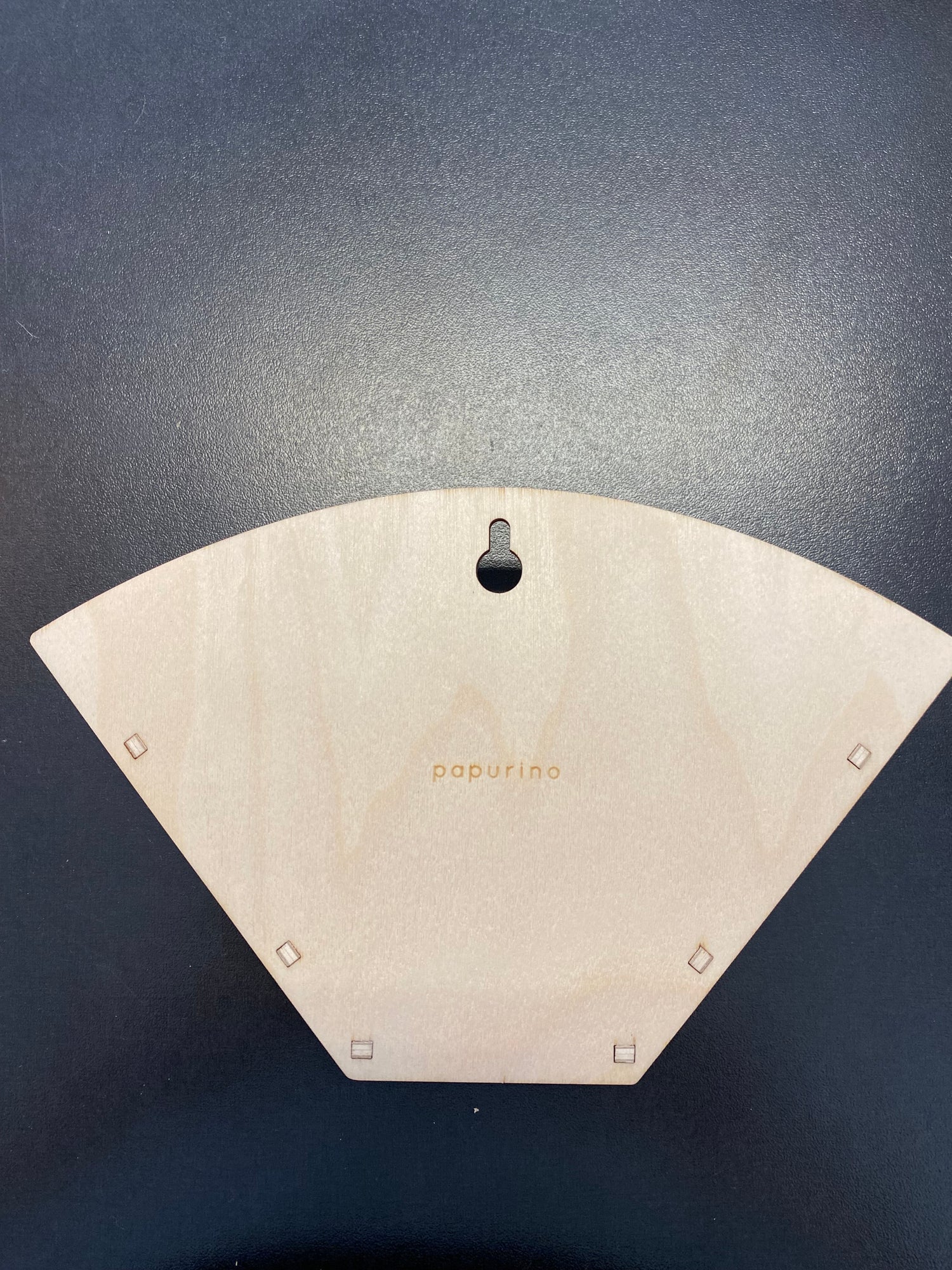 Puinen suodatinpussiteline