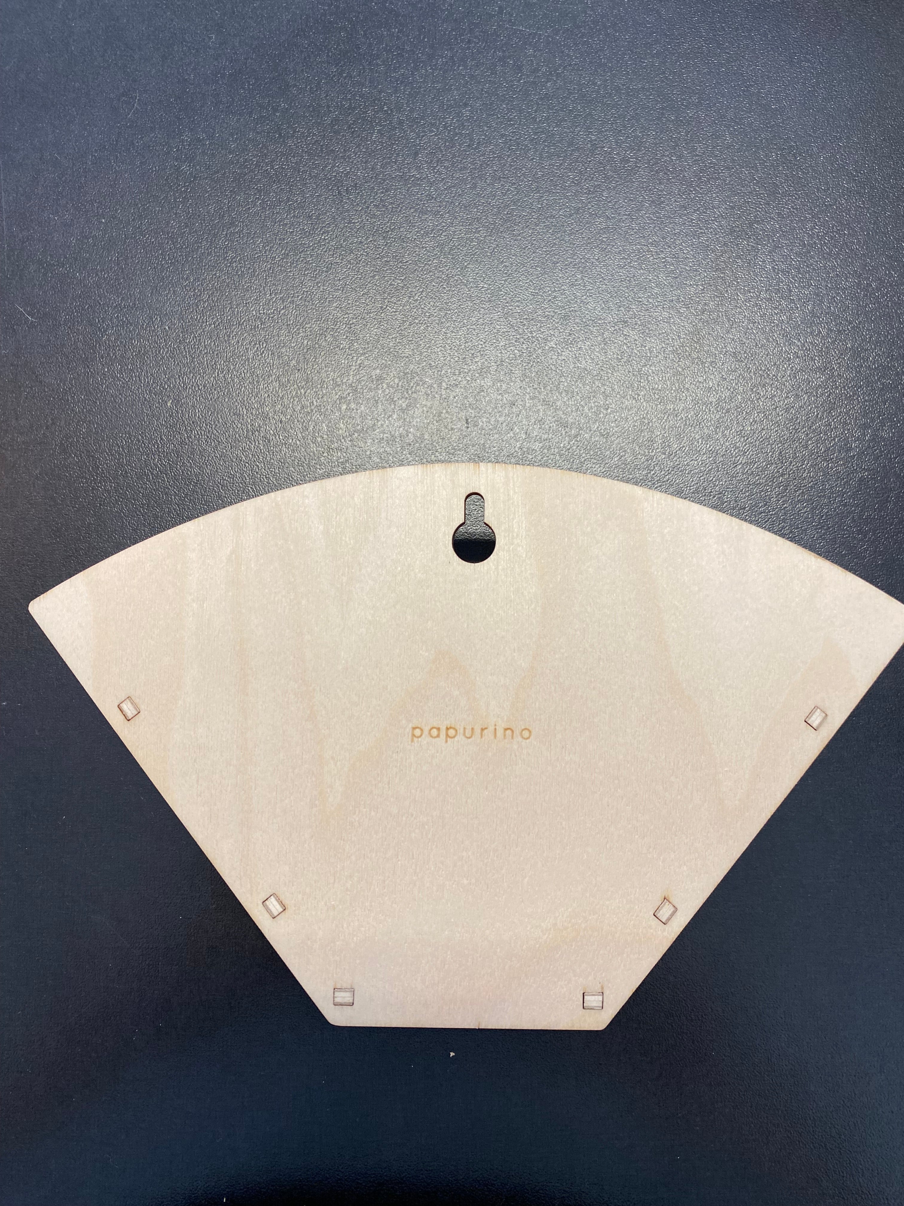 Puinen suodatinpussiteline