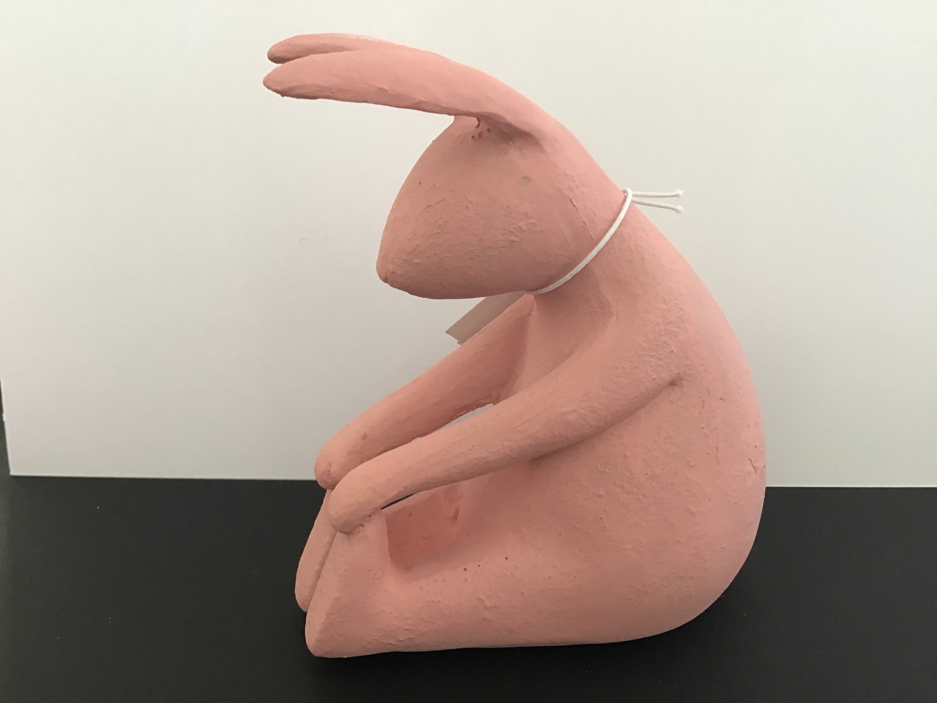 Pupu istuva, pinkki.