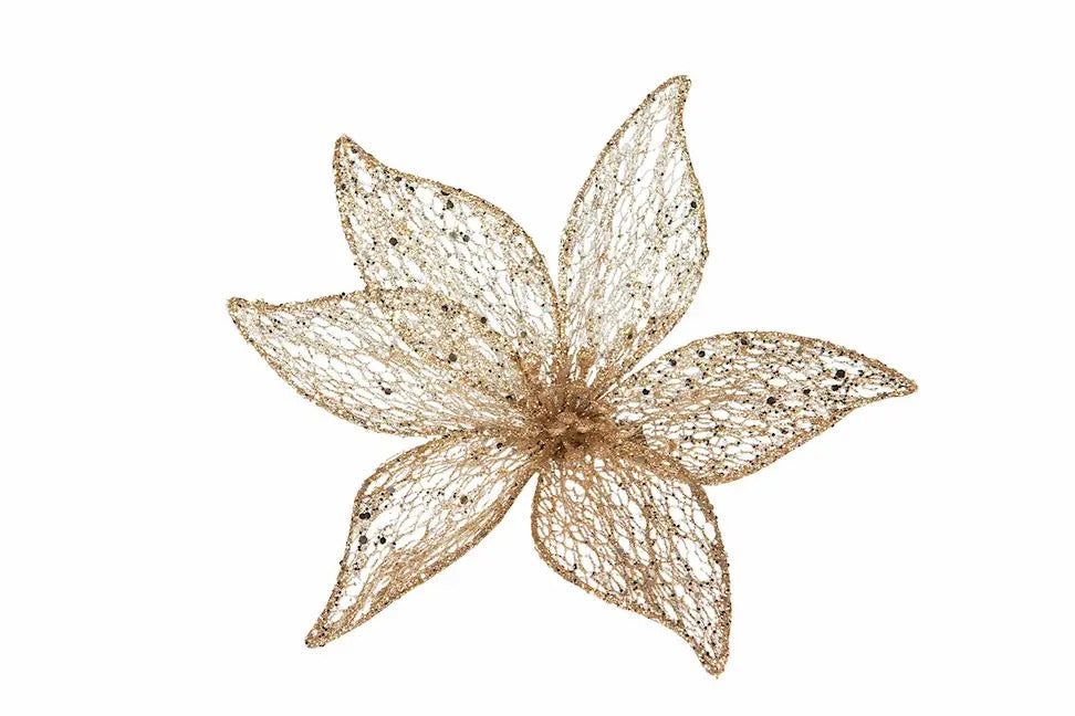 Kultaisesta läpinäkyvästä kankaasta valmistettu kaunis kukka, metalliklipsillä